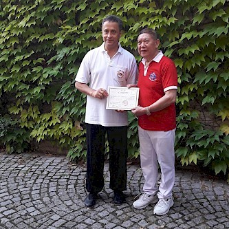 Shibashi Qigong founder, Professor Lin Housheng, awarding me my Shibashi Levels 4 & 8 Instructor Certificate in September 2016, in Baden-Baden, Germany